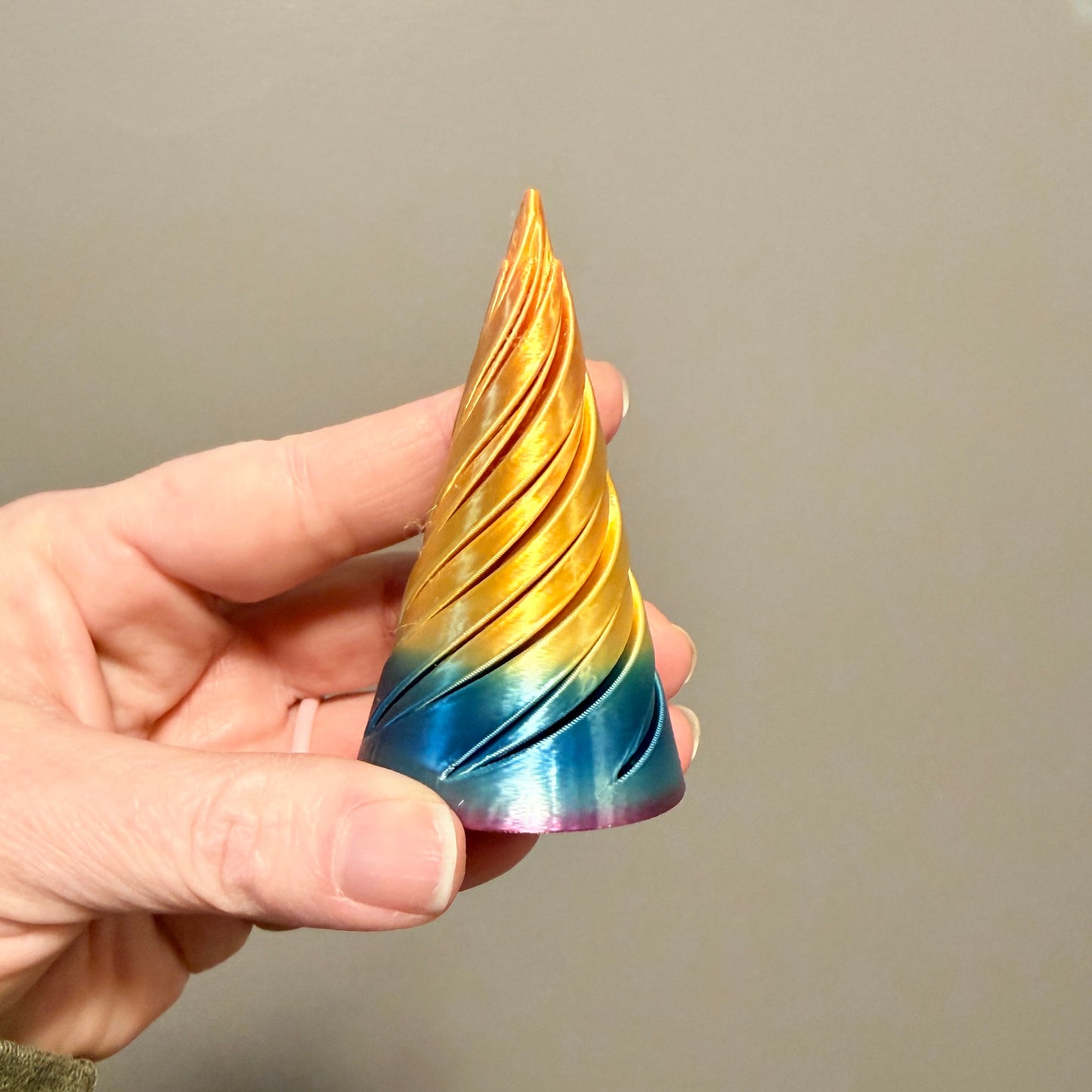 Purple, yellow and blue cone fidgets